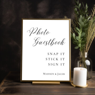 Editable Canva photo guestbook guestbook in Elegant Script wedding style shown in dark room