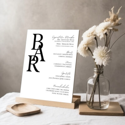 Editable Canva bar sign in Simple Script wedding style shown in tabletop display
