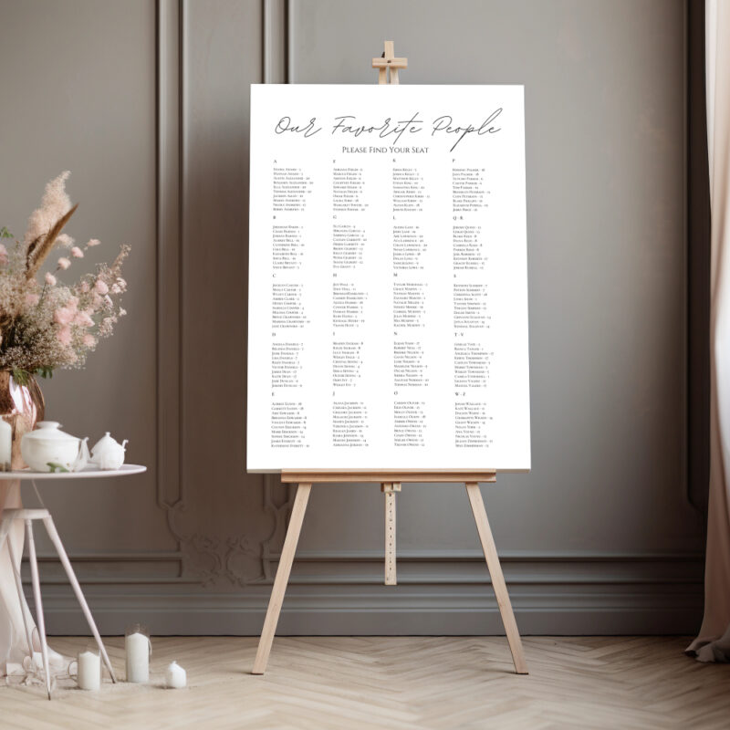 Editable Canva seating chart in Simple Script wedding style shown in dark room