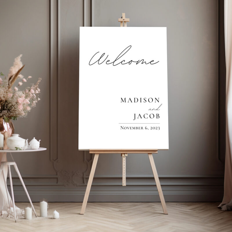 Editable Canva welcome sign in Simple Script wedding style shown in dark room